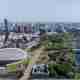 Looking over the olympic park with the velodrome in foreground and stadium in background.