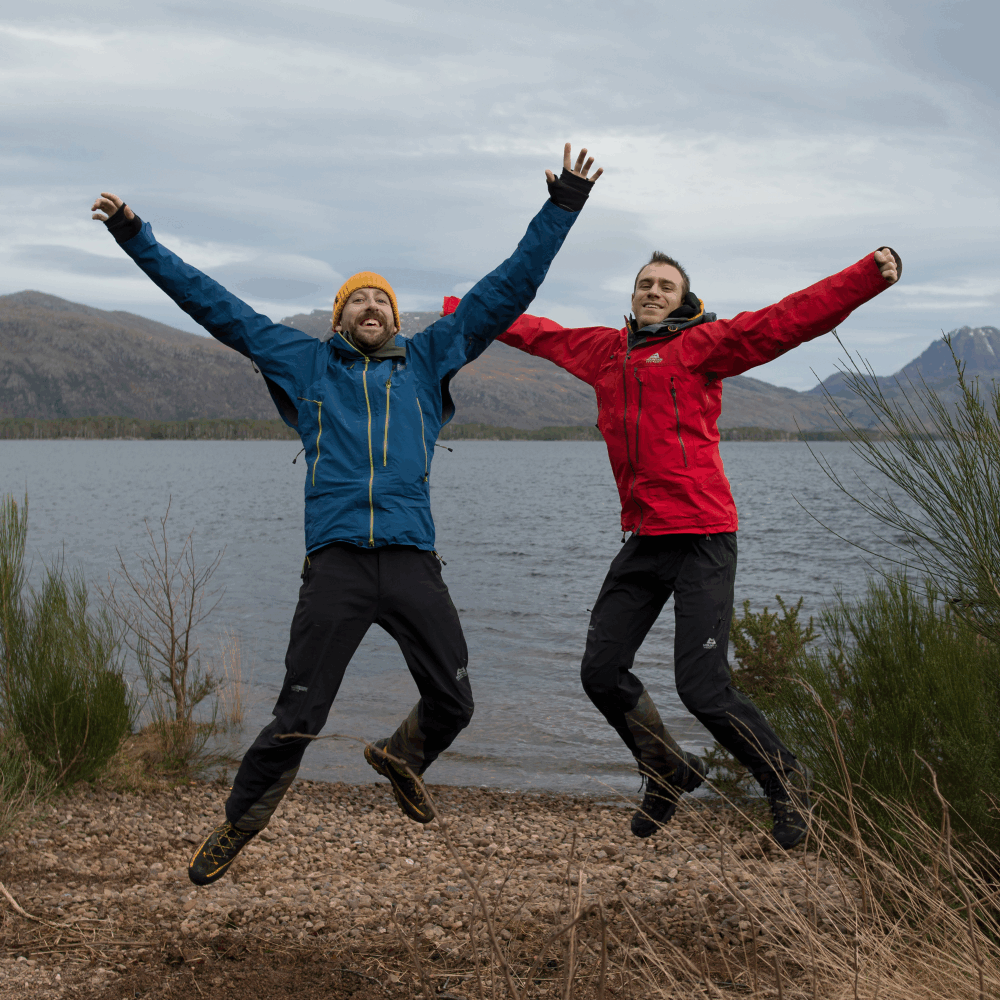 Ed and Chris jumping in the air. The photo is an animation between two frames taken inches apart, giving the pair a 3d quality.