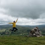 Ed jumping in mid-air. He’s facing sideways.