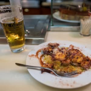 A photo of an octopus dish served at El Xampanyet.