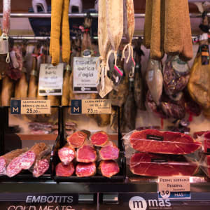 A photo of a meat counter in a market.