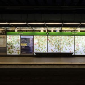 A photo of the side of a metro platform, taken from the opposite side.