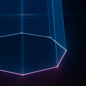 A laser beam projects from above on to the ground. It has traced an octagon shape.
