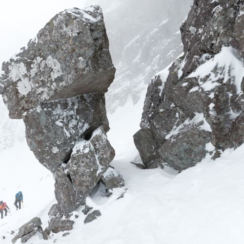 The Improbable Pedestal at the start of the ledge route. A tall, top-heavy rock stood apart from the mountainside.