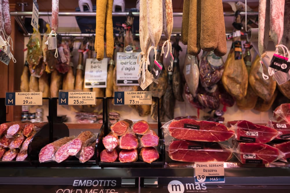 A photo of a meat counter in a market.