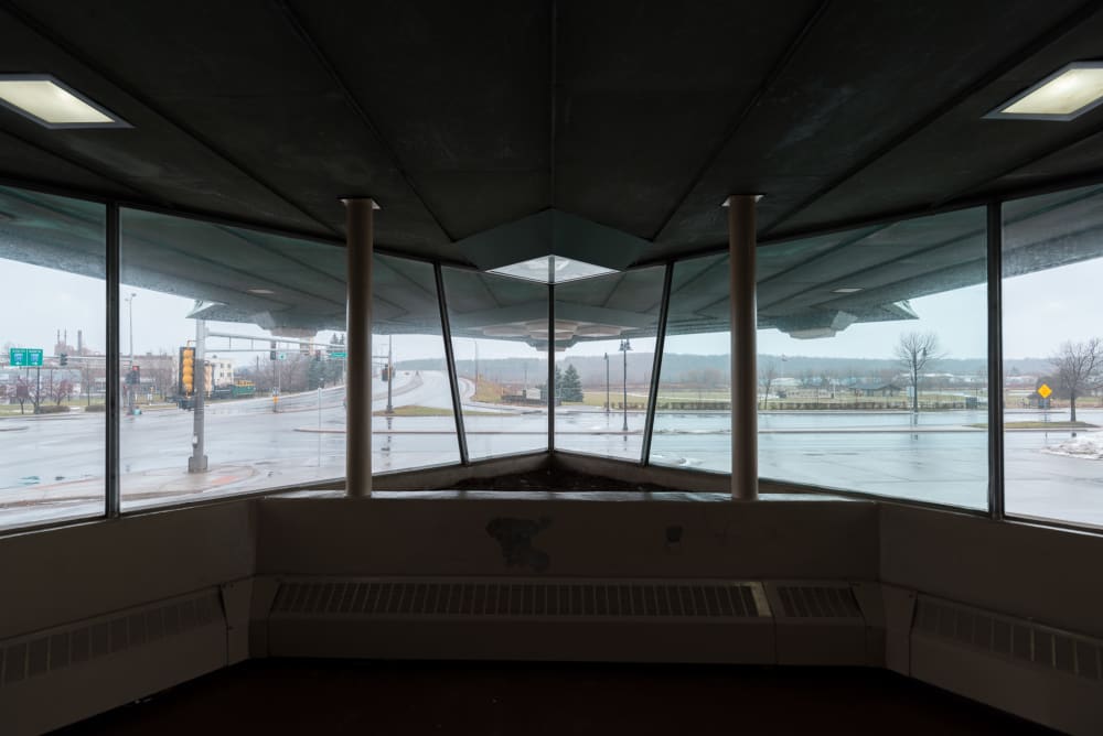 Looking out the viewing area inside the Frank Lloyd Wright gas station.