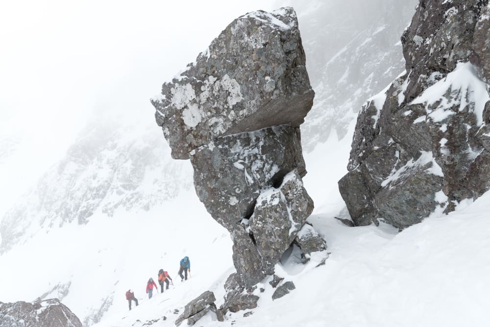 The Improbable Pedestal at the start of the ledge route. A tall, top-heavy rock stood apart from the mountainside.