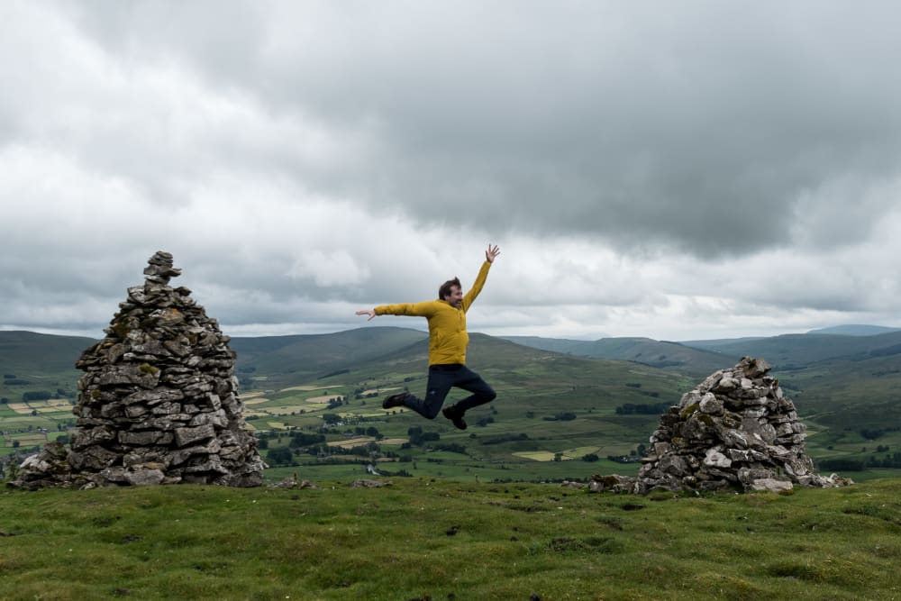 Ed jumping in mid-air. He’s facing sideways.