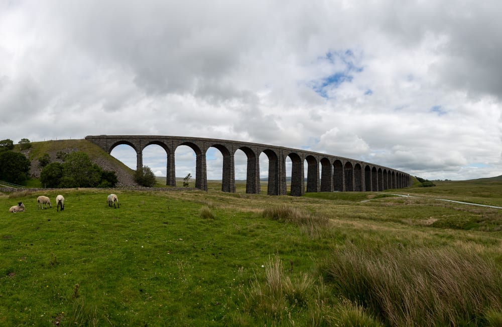 A panorama of Ribblehead Viaduct from a distance.