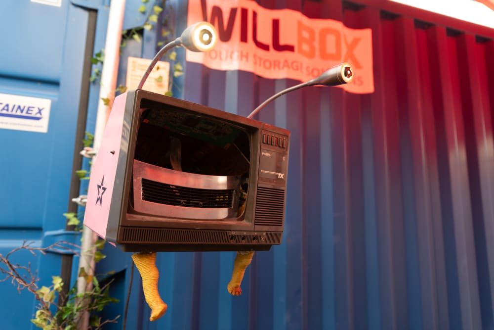 An empty plastic CRT case with two lights for eyes