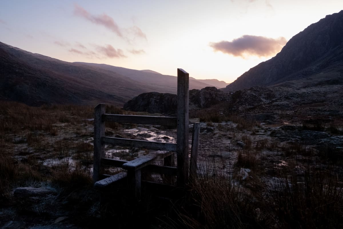 A style on a mountainside at dawn.