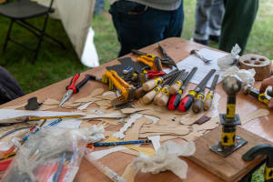 A selection of tools on a table.