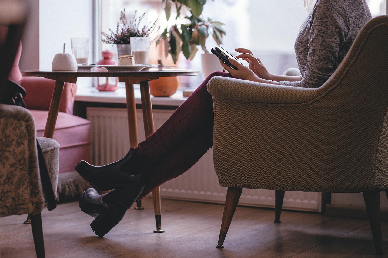 Person reading in a cozy café setting