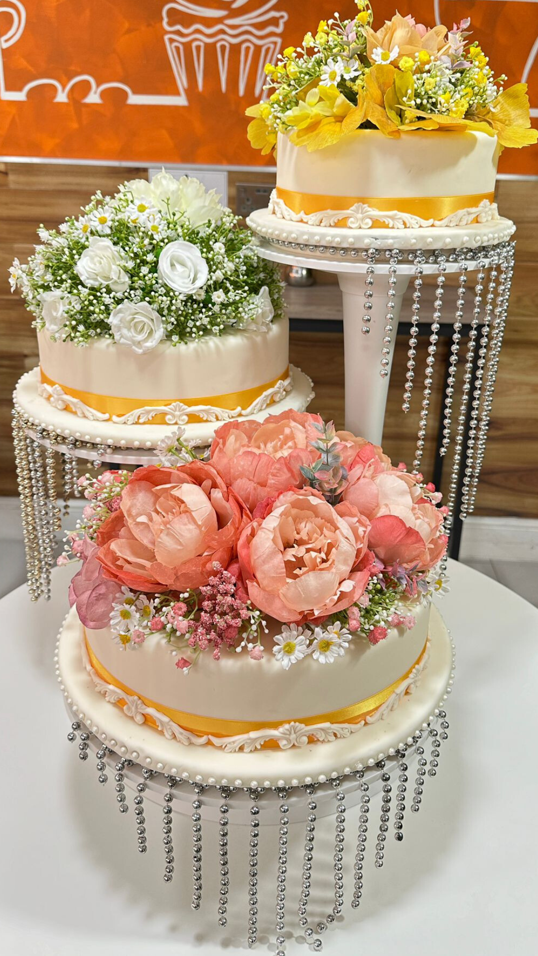 cake image of 12"/4" , 10"/4" & 8"/4" - £550 (with stand)