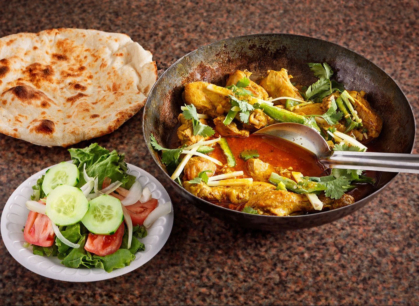 Half chicken karahi, 2 seekh kabab, raita, salad, 3 roghni naan