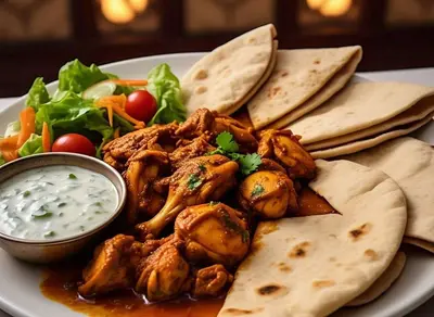 CHICKEN HALF KARAHI 5 CHAPATI RAITA / SALAD