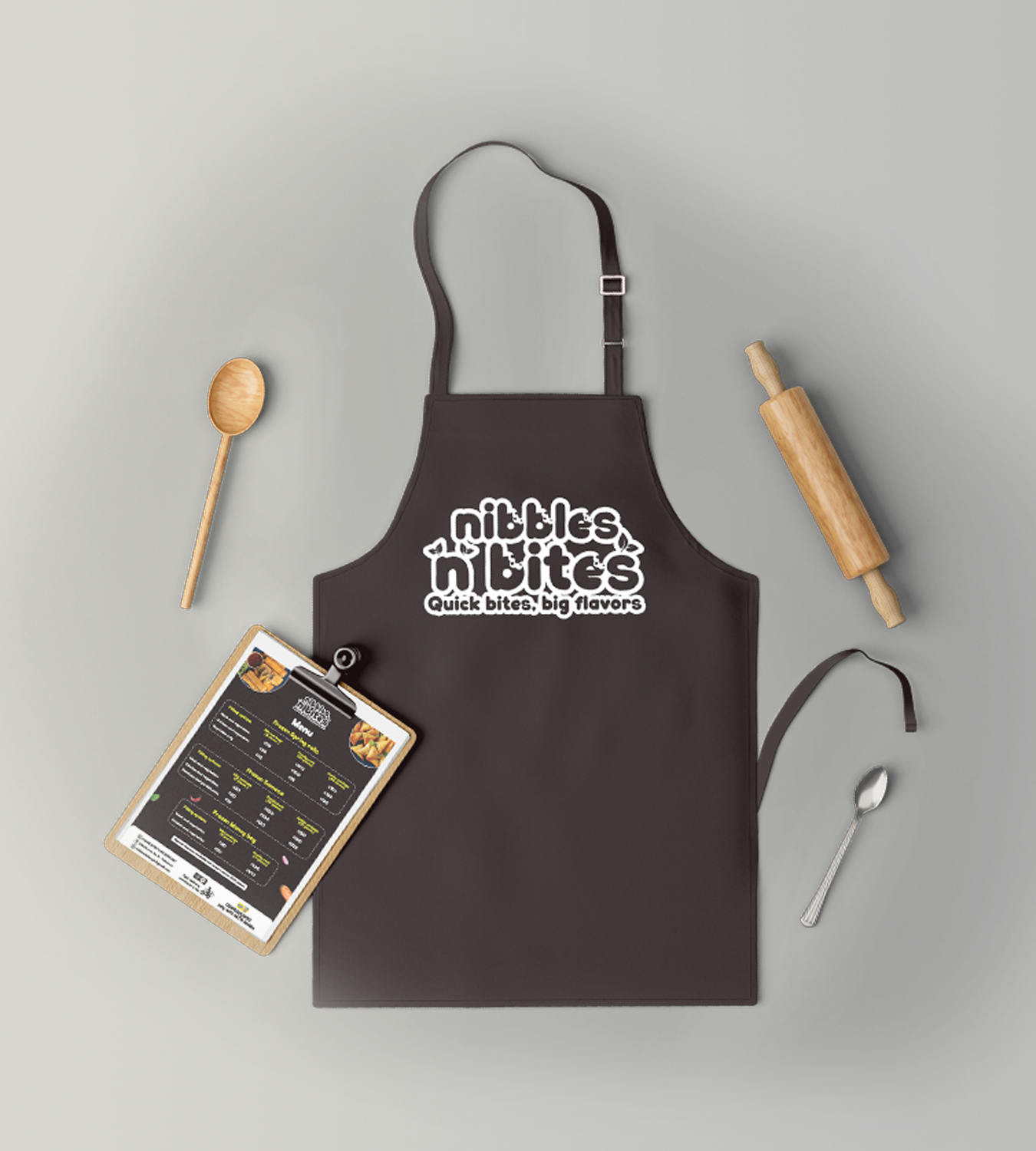 Nibbles N Bites — dark colourway staff apron