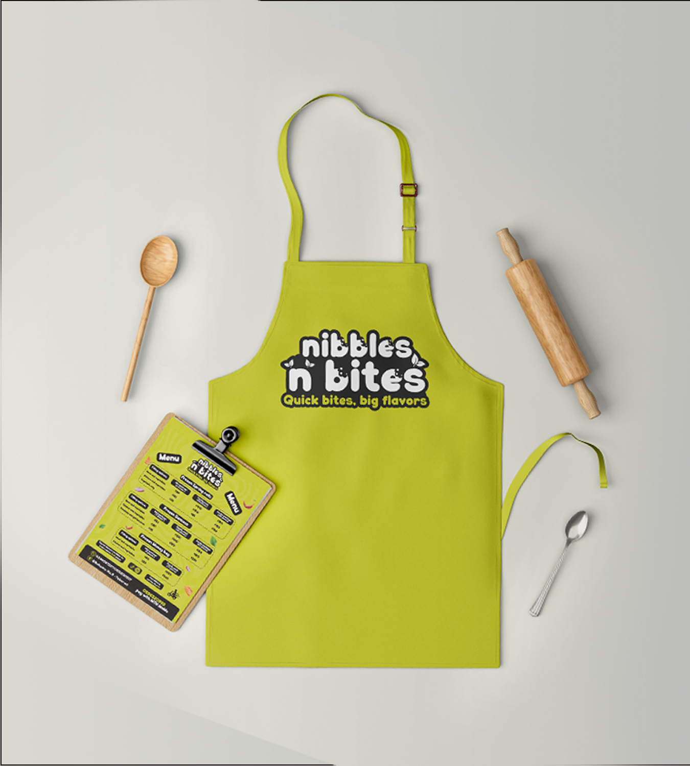 Nibbles N Bites — lime green colourway staff apron