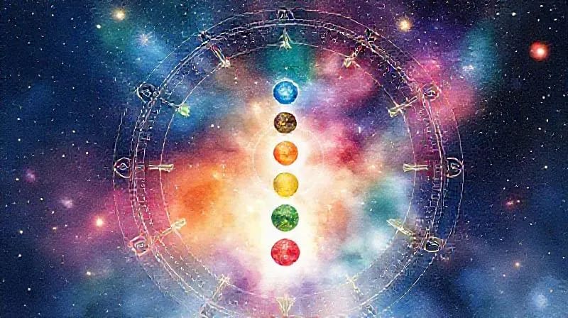 Ilustración acuarela de los siete chakras con alimentos asociados a cada color y energía.