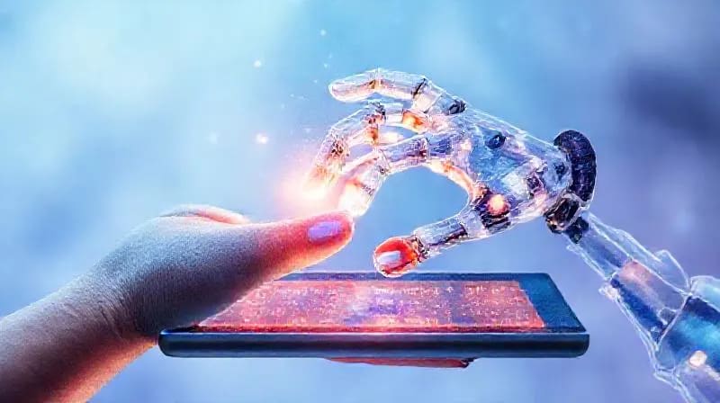 Human hand and robotic hand gently touching over a digital tablet displaying an unfinished artwork.