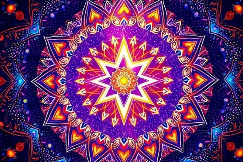 Mándala vibrante con patrones de energía cuántica y geometría sagrada, simbolizando la interconexión de la materia y el espíritu.