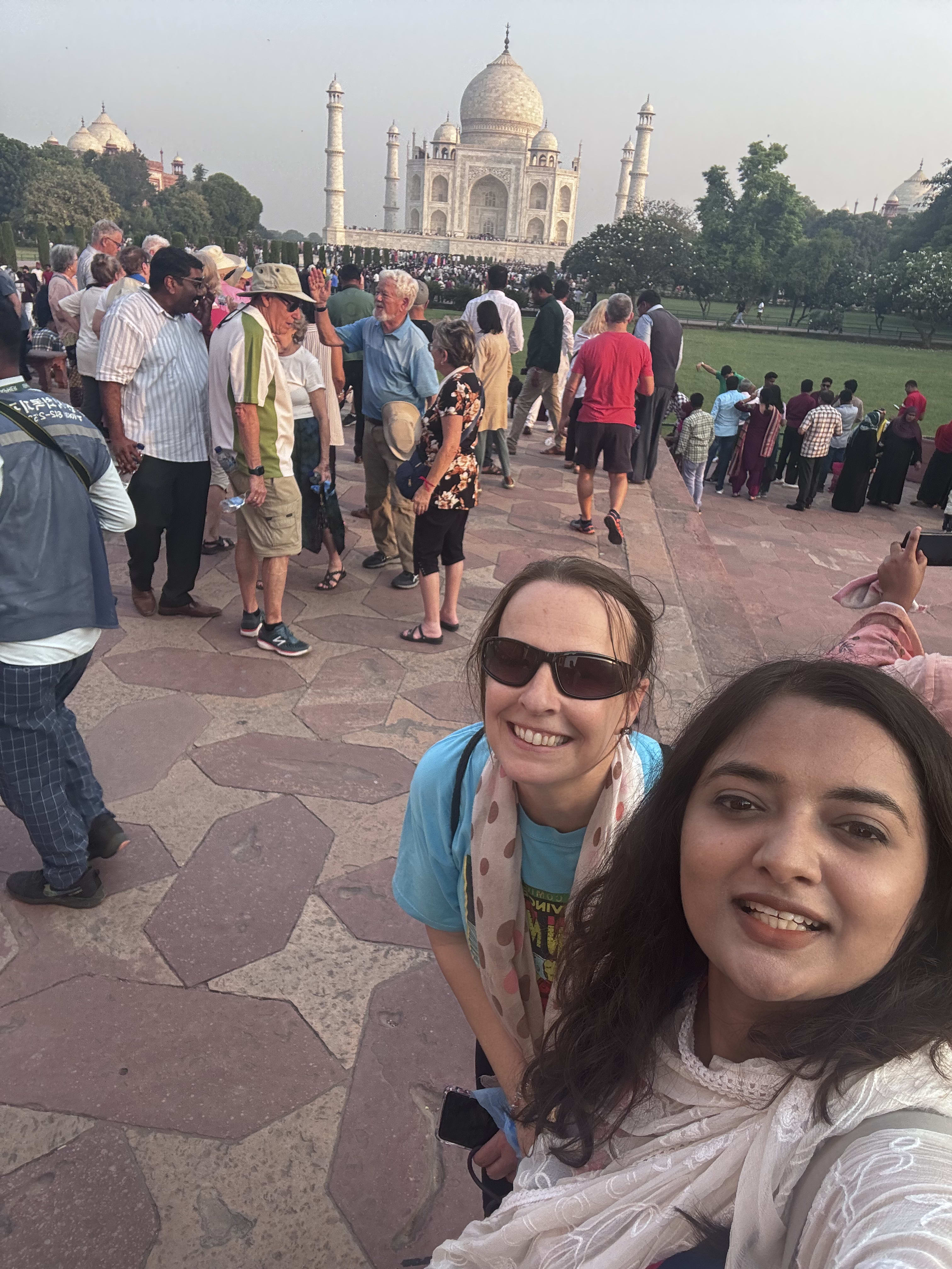 A selfie in the crowd at a busy monument