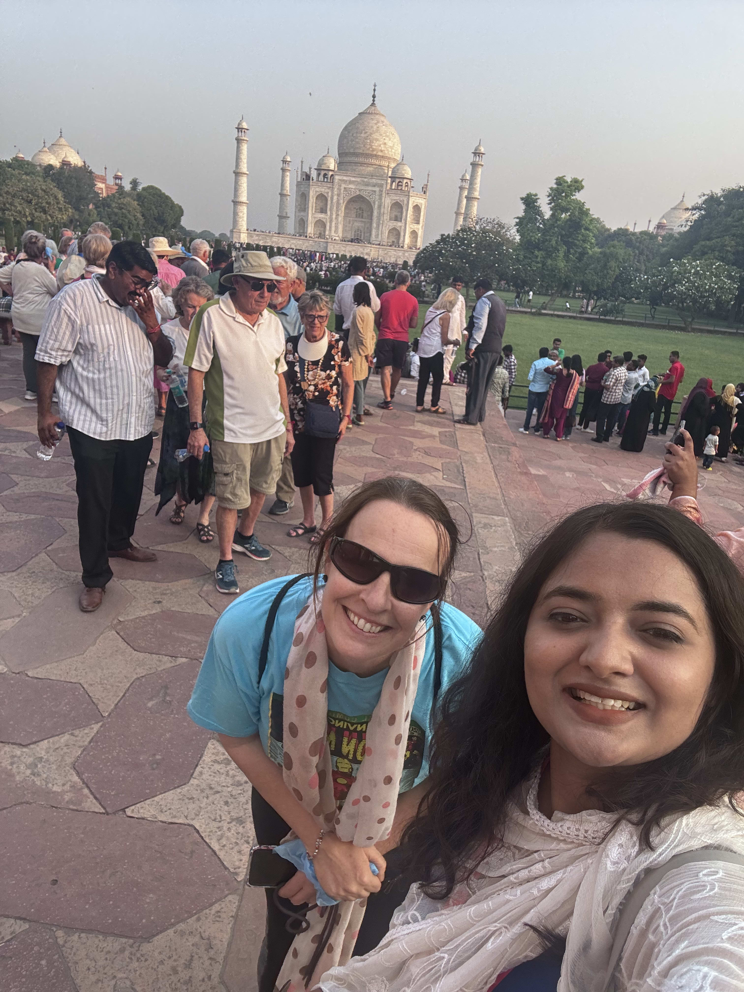 Travellers taking a selfie among the crowds