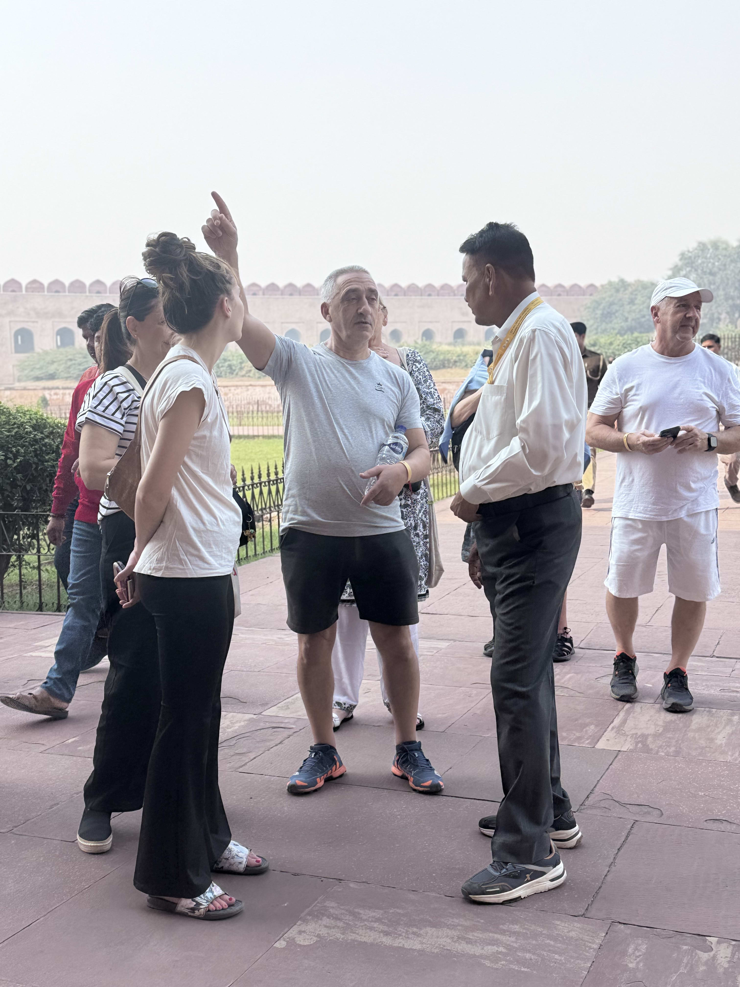 Travellers with their guide at a fort