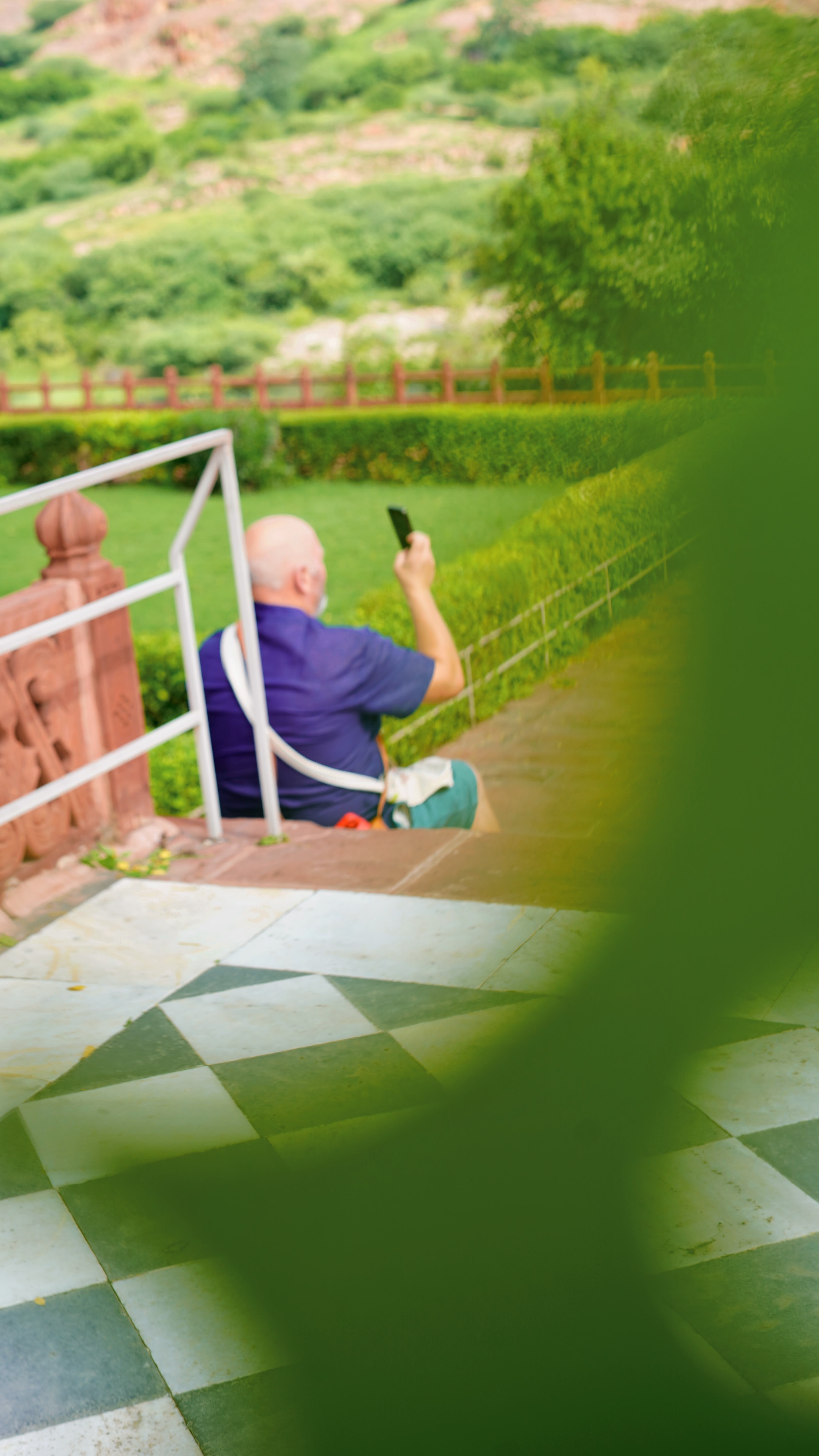 Golden late-afternoon light over a quiet Rajasthan fort with few visitors around
