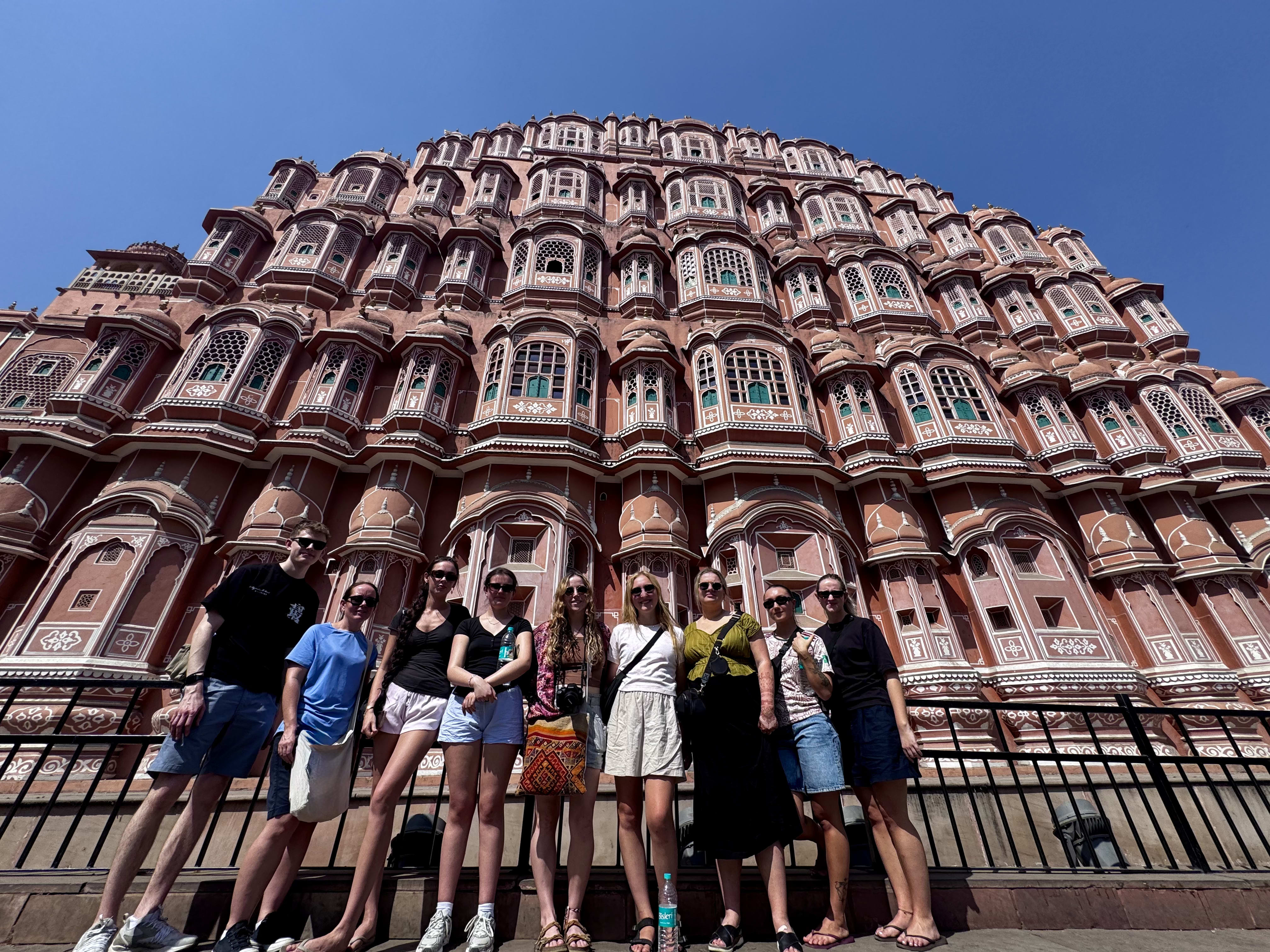 Travellers in front of Hawa Mahal in Jaipur