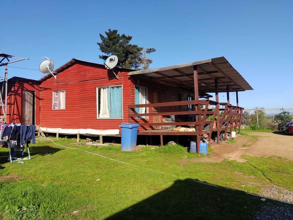 TERRENO CON CASA
