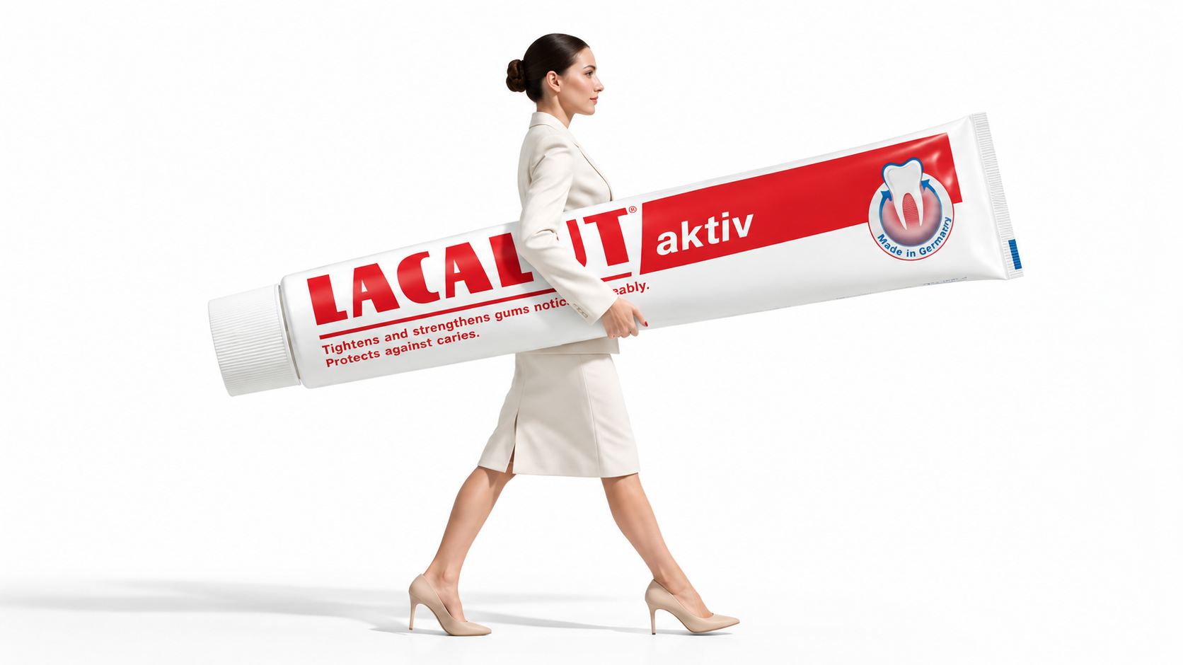 Lacalut Active toothpaste campaign featuring a woman carrying an oversized tube