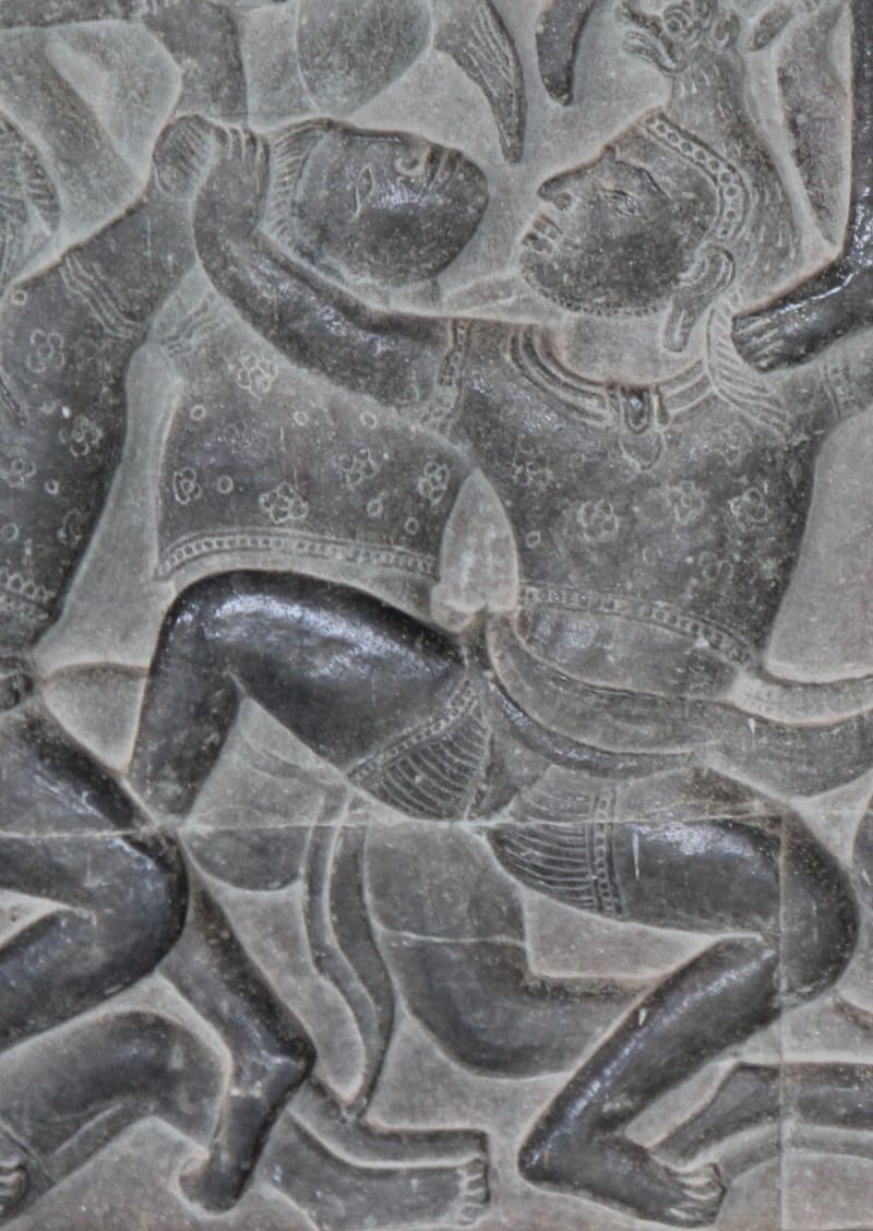 Kampfszenen als Basrelief in Angkor Wat, Kambodscha, 12. Jahrhundert