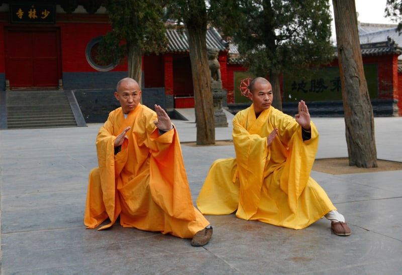 Shaolin grandmasters Shi DeRu and Shi DeYang demonstrating a form