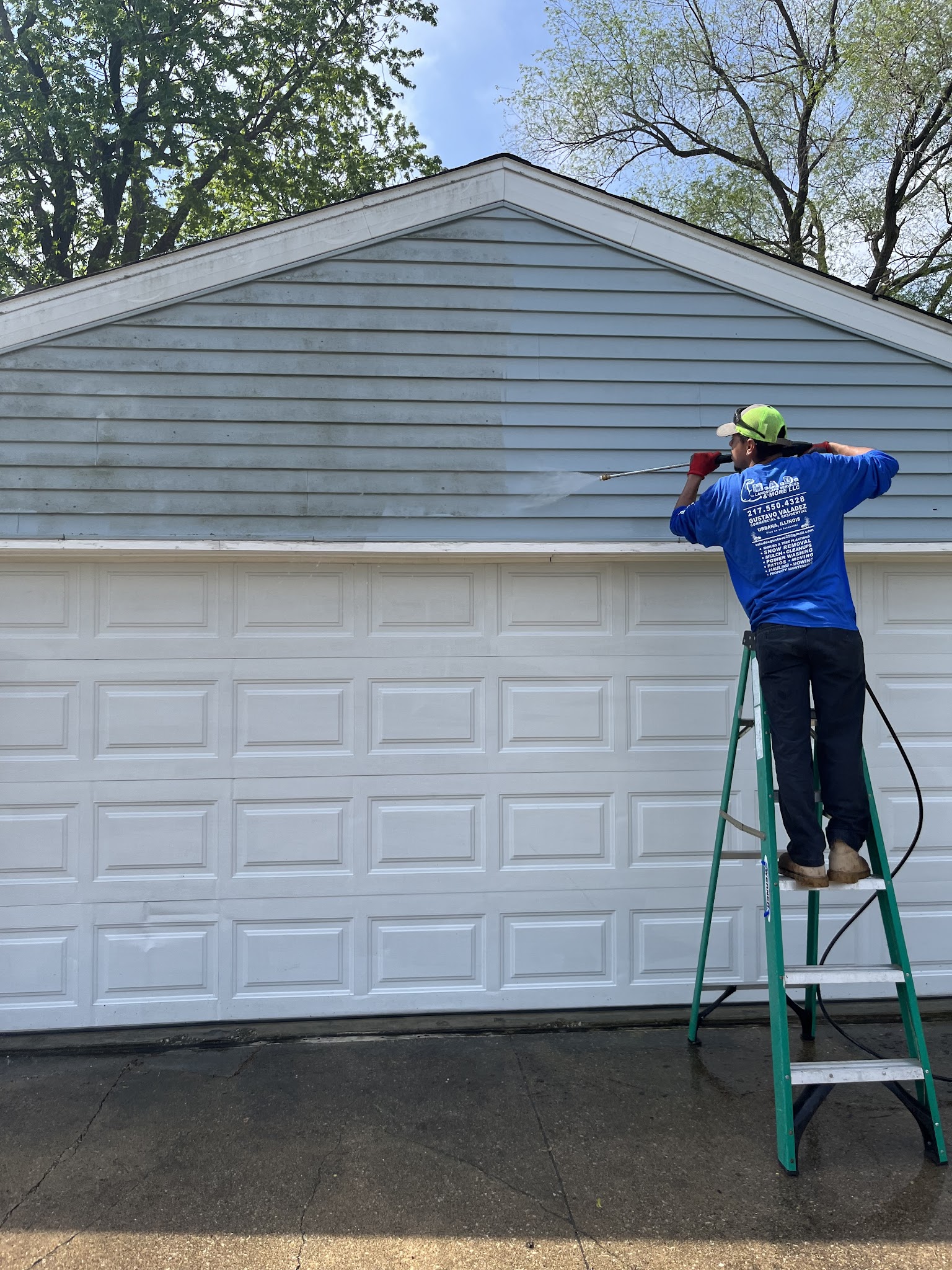 M.A.D Landscape crew member at work on a property in Champaign-Urbana, IL