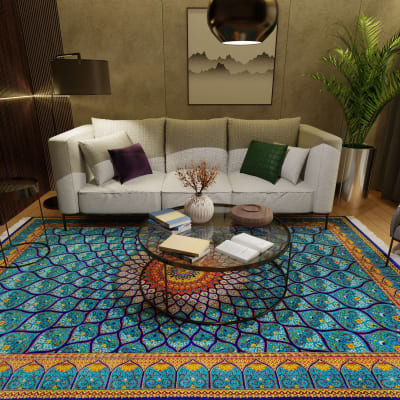 Mehreen Carpets Dubai Mall: Luxurious blue patterned carpet, elegant sofa, glass table, and modern decor.
