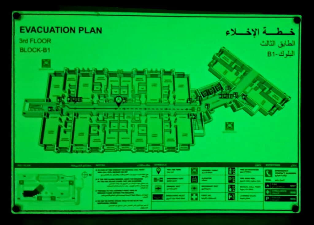 A clear, well-lit photoluminescent evacuation plan