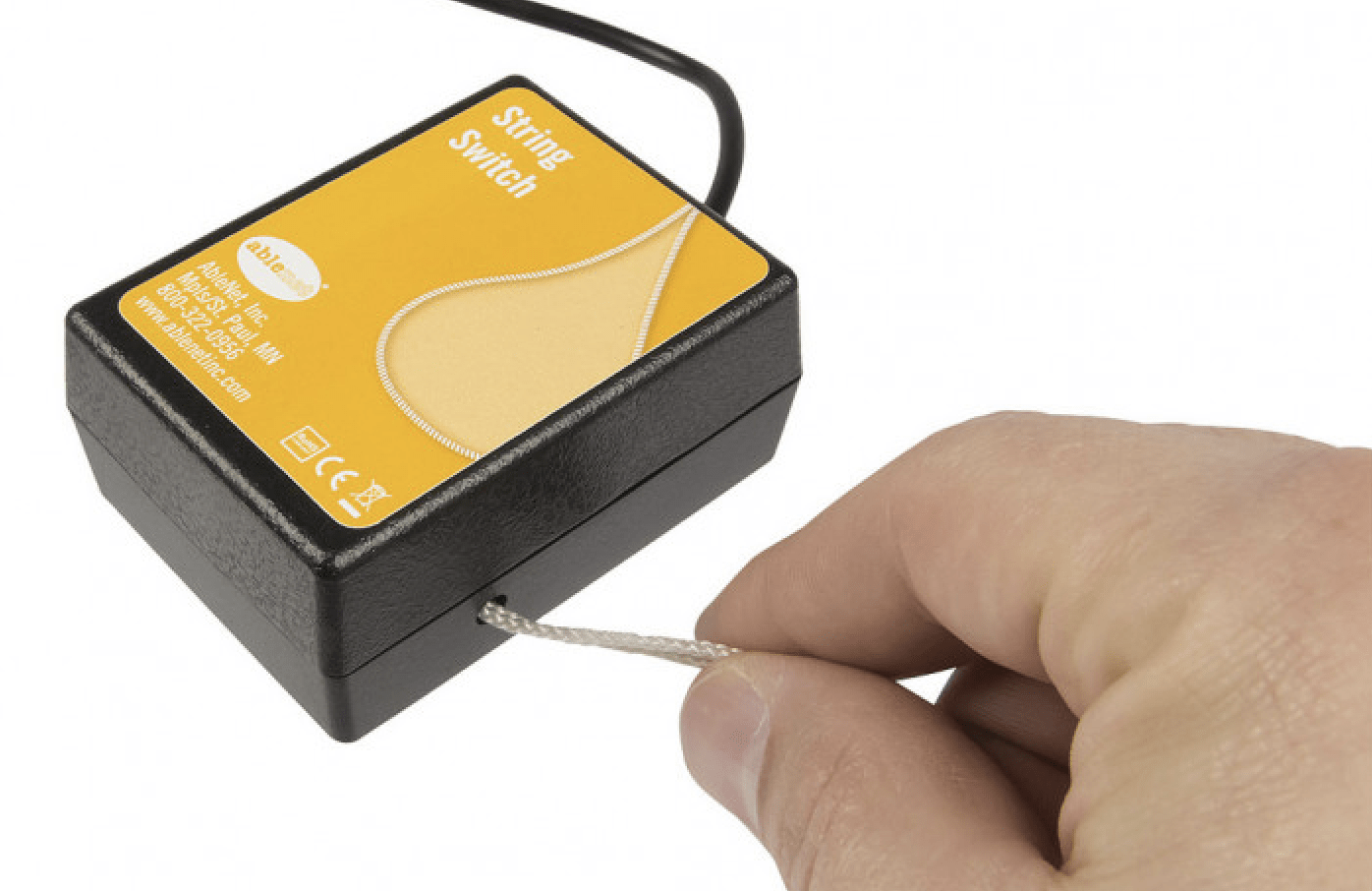 A string switch being pulled by a users hand