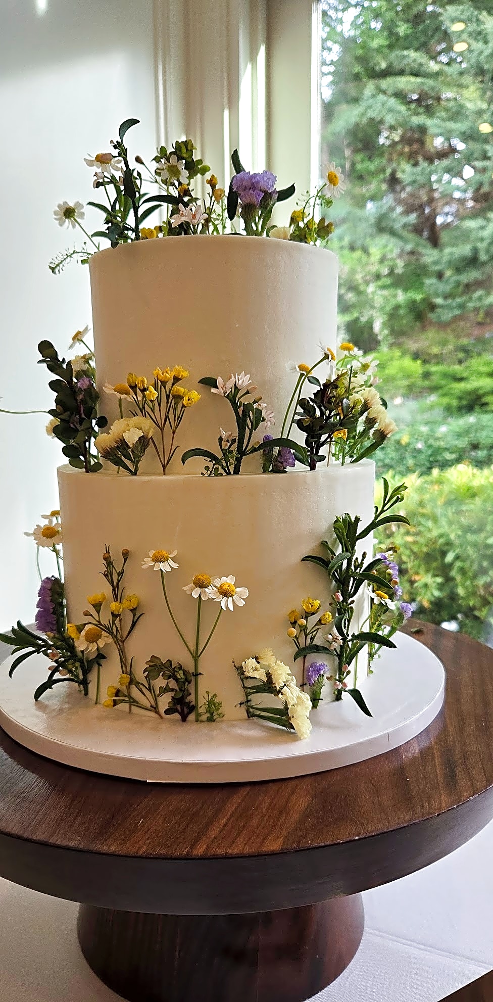 Millcreek Inn Wedding Cake with Wildflowers | Sweet E's