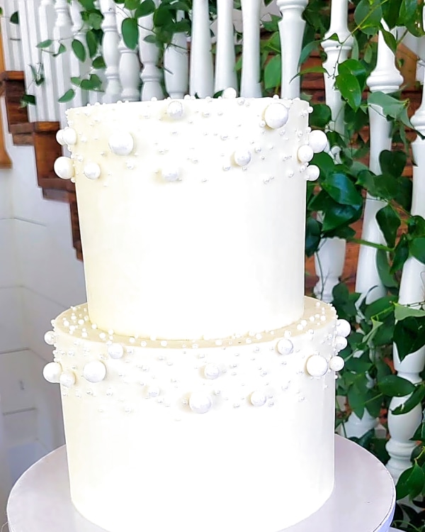 Walker Farms wedding cake, a two-tier wedding cake with smooth white finish and scattered white pearls