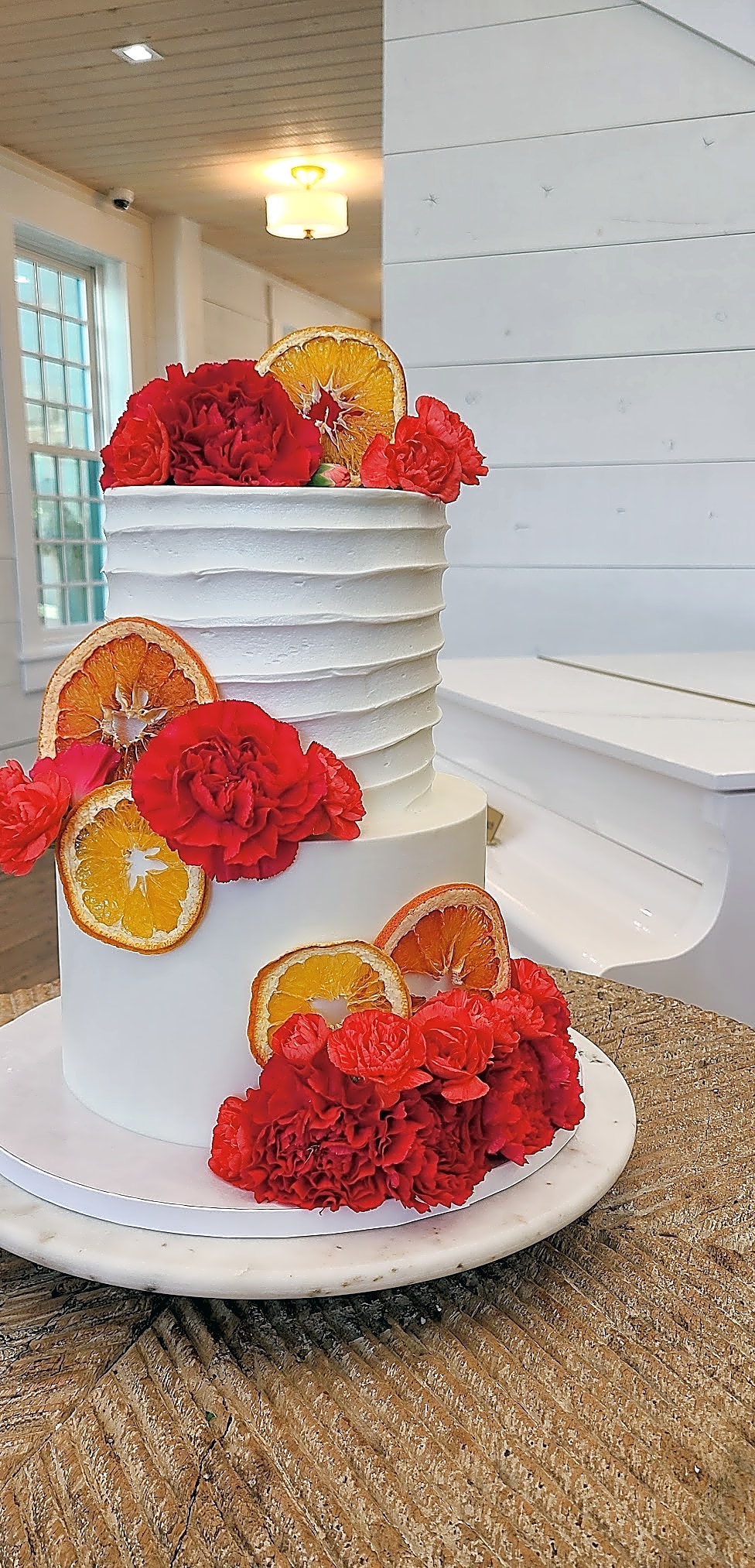 Utah Wedding Cake with Red Florals & Dried Oranges | Sweet E's