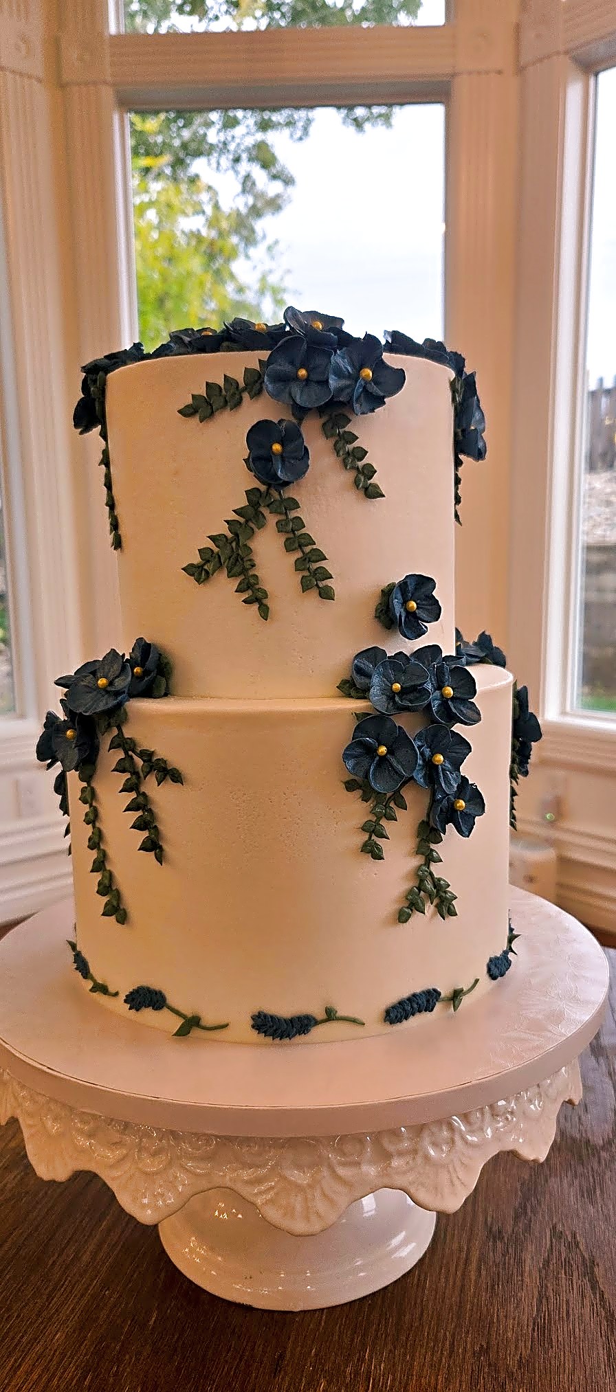 The Caledonia wedding cake with blue florals | Sweet E's