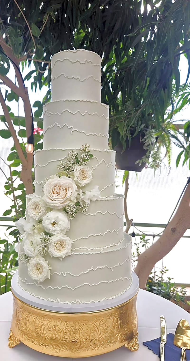Five-tier wedding cake at La Caille, Sandy, by Sweet E's Bakery