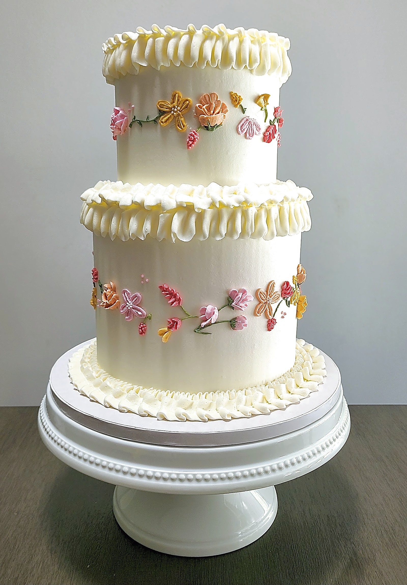 Utah Wedding Cake with Ruffles and Piped Flowers | Sweet E's