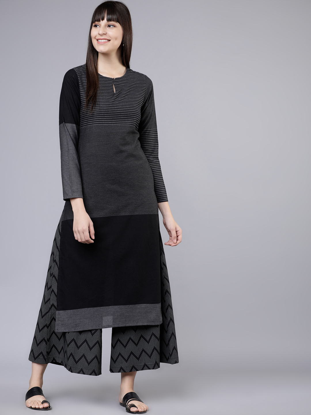 Vishudh Women Black & Grey Striped Kurta with Palazzos Price in India