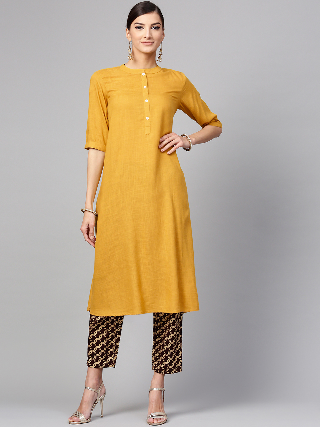 Libas Women Mustard Yellow & Brown Solid Kurta with Trousers Price in India