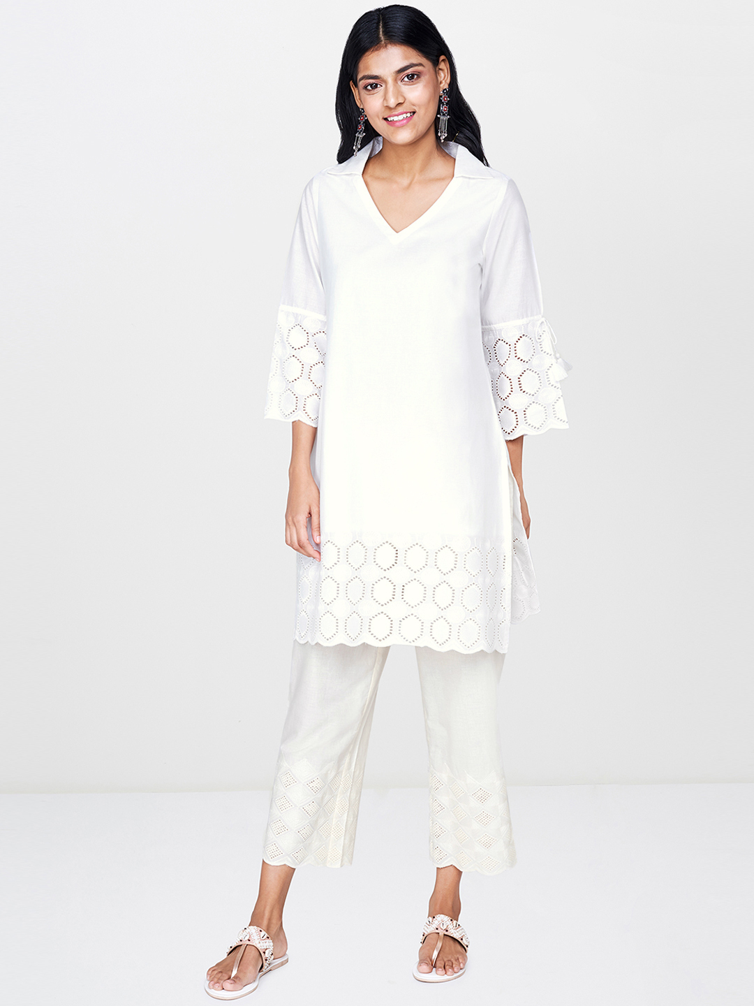Global Desi Women White Solid Straight Kurta With Embroidered Detailing Price in India