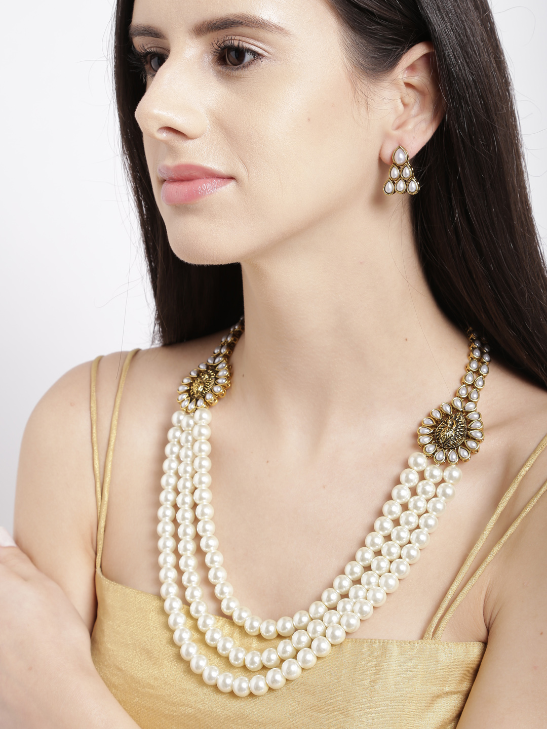 Zaveri Pearls White & Antique Gold-Toned Beaded Jewellery Set Price in India