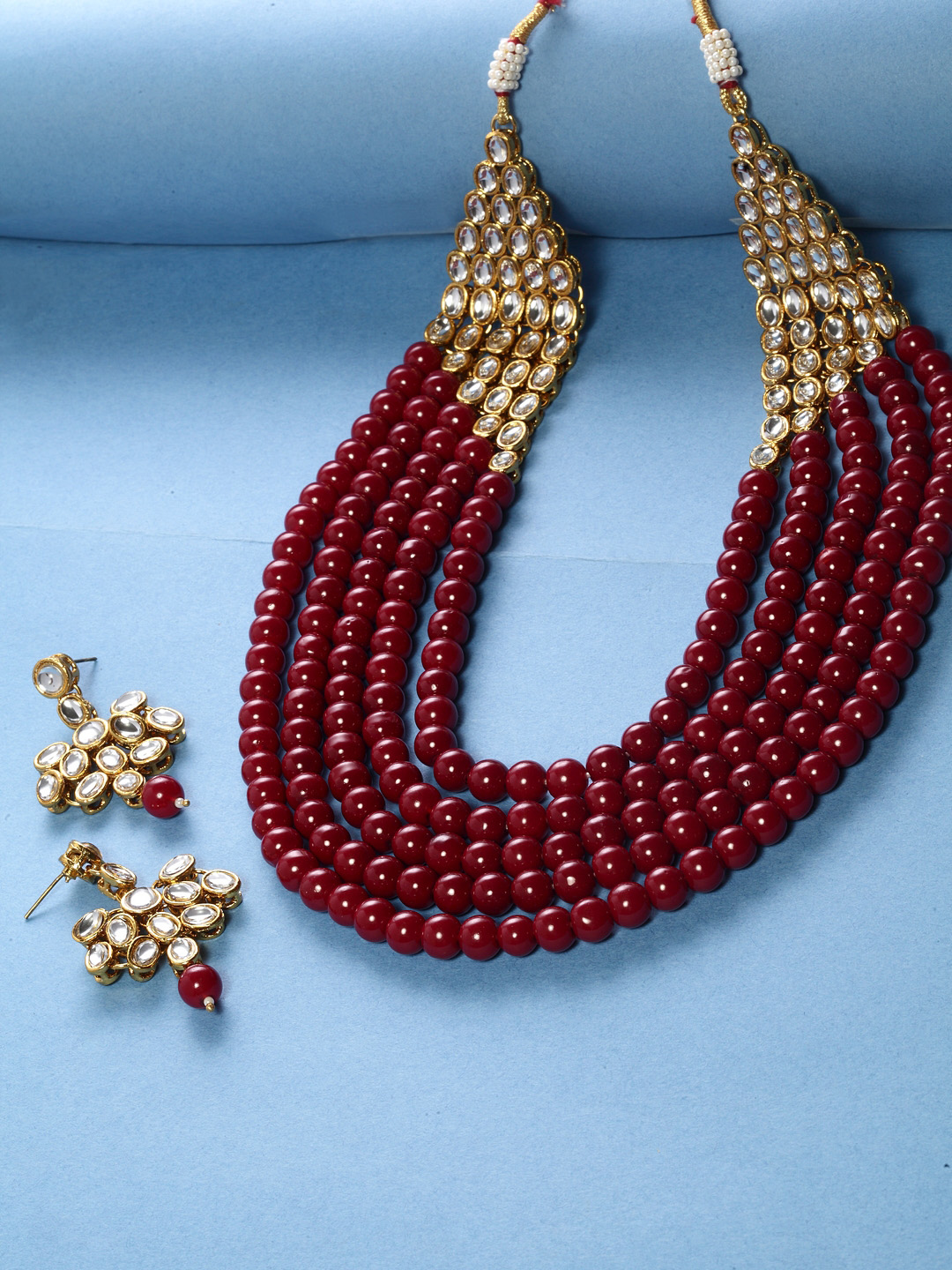 Shining Diva Women Gold-Plated & Red Beaded Kundan Jewellery Set Price in India