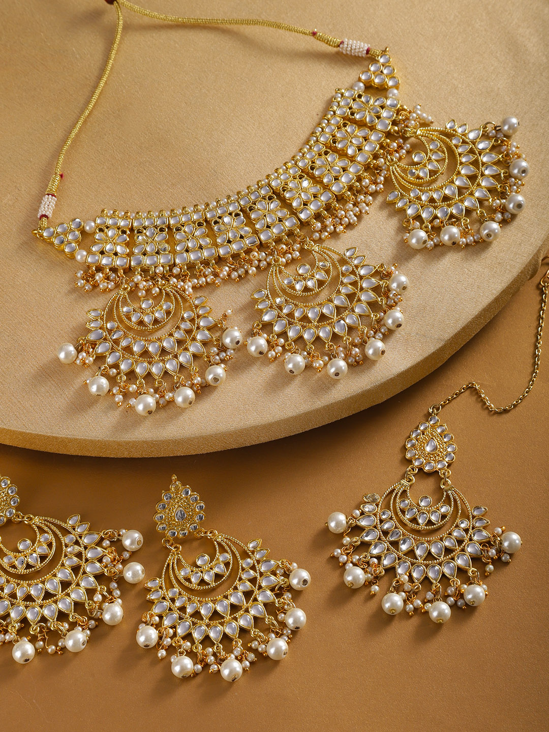 KARATCART Off-White Gold-Plated Kundan Studded & Beaded Handcrafted Jewellery Set Price in India